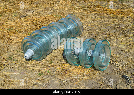 High-voltage insulators of glass insulators. Installation of high-voltage power lines Stock Photo