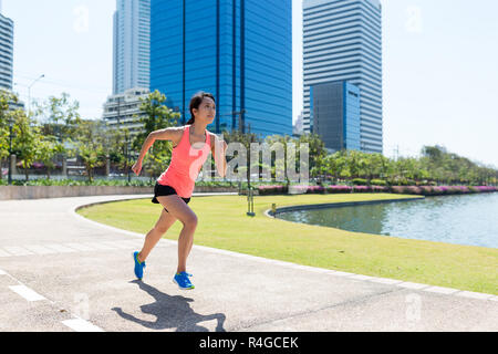 Woman run at the park Stock Photo