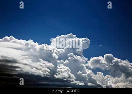 ID00701-00...IDAHO - Storm clouds forming over the Swan Valley and the Teton Range. Stock Photo