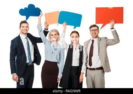 smiling businesspeople holding colorful speech bubbles isolated on white Stock Photo