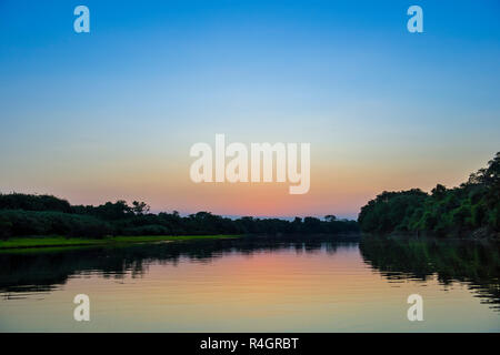 River landscape with Rio Negro at sunset, Fazenda Barranco Alto, Pantanal, Mato Grosso do Sul, Brazil