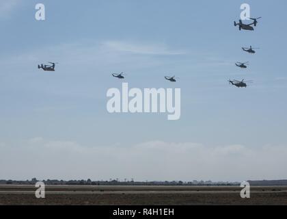 Two MV 22B Ospreys an AH 1 Super Cobra a UH 1Y Huey and a CH 53E