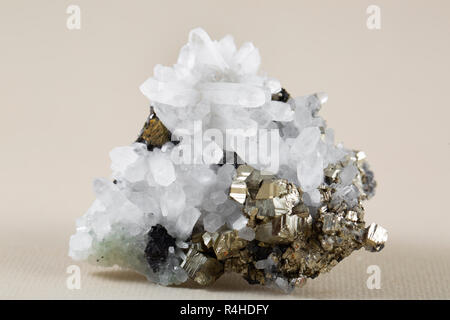 Pyrite on white background, also known as iron pyrite and fools gold Stock Photo