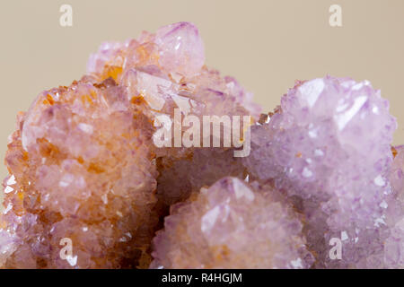 Pretty Sparkle Amethyst Spirit Quartz cluster from South Africa, isolated on white background Stock Photo