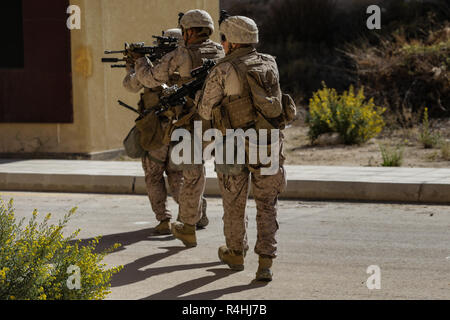 UNDISCLOSED LOCATION, SOUTHWEST ASIA – U.S. Marines with 3rd Battalion 4th Marine Regiment, attached to Special Purpose Marine Air-Ground Task Force, Crisis Response-Central Command, engage their targets during a live fire range November 18, 2018. The Marines conducted live fire ranges to enhance infantry skills and combat readiness during Exercise Cunning Seahorse. (U.S. Marine Corps photo by Cpl. Teagan Fredericks) Stock Photo