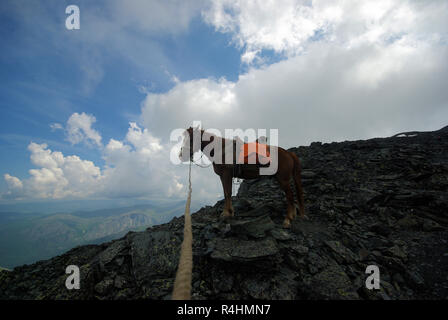 Mountain landscape. Highlands, the mountain peaks, gorges and valleys. The stones on the slopes Stock Photo