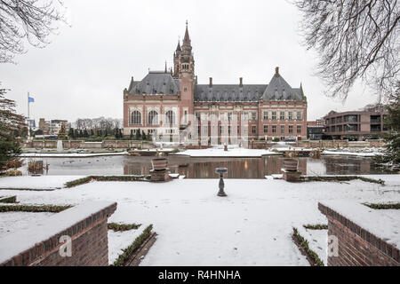 THE HAGUE, 11 December 2017 - Snow on the Peace Palace, seat of the International Court of Justice and Principal judicial organ of the United Nations  Stock Photo