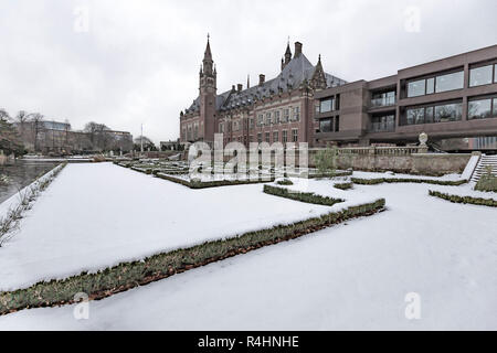 THE HAGUE, 11 December 2017 - Snow on the Peace Palace, seat of the International Court of Justice and Principal judicial organ of the United Nations  Stock Photo