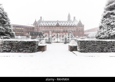 THE HAGUE, 11 December 2017 - Snow on the Peace Palace, seat of the International Court of Justice and Principal judicial organ of the United Nations  Stock Photo