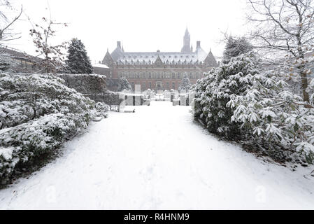 THE HAGUE, 11 December 2017 - Snow on the Peace Palace, seat of the International Court of Justice and Principal judicial organ of the United Nations  Stock Photo