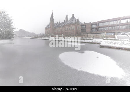 THE HAGUE, 11 December 2017 - Snow on the Peace Palace, seat of the International Court of Justice and Principal judicial organ of the United Nations  Stock Photo