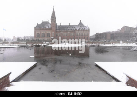 THE HAGUE, 11 December 2017 - Snow on the Peace Palace, seat of the International Court of Justice and Principal judicial organ of the United Nations  Stock Photo