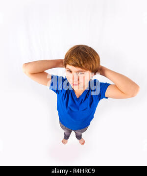 funny perspective of standing handsome boy Stock Photo