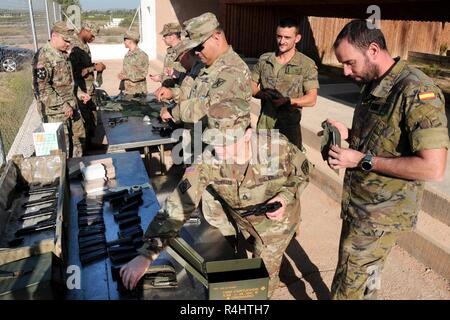 US Army Soldier from NRDC Spain and a Spanish Soldier from NRDC Spain ...