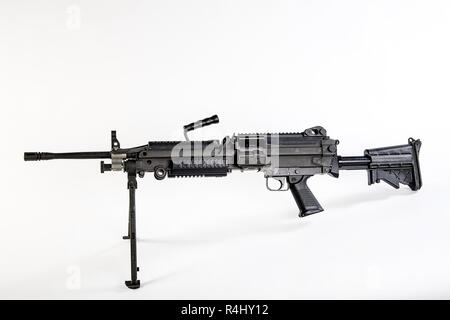 The M249 light machine gun, formerly designated the M249 Squad ...
