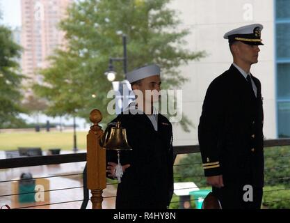 The Hampton Roads Naval Museum hosted a retirement ceremony today at the Nauticus Campus in Downtown Norfolk, Virginia. The ceremony was for Captain Mitchell, from Naval Medical Center-Portsmouth. Members of his command, family members, friends and invited guests were in attendance during the ceremony. Stock Photo