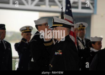 The Hampton Roads Naval Museum hosted a retirement ceremony today at the Nauticus Campus in Downtown Norfolk, Virginia. The ceremony was for Captain Mitchell, from Naval Medical Center-Portsmouth. Members of his command, family members, friends and invited guests were in attendance during the ceremony. Stock Photo