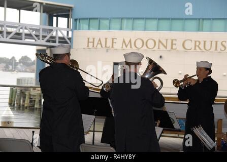 The Hampton Roads Naval Museum hosted a retirement ceremony today at the Nauticus Campus in Downtown Norfolk, Virginia. The ceremony was for Captain Mitchell, from Naval Medical Center-Portsmouth. Members of his command, family members, friends and invited guests were in attendance during the ceremony. Stock Photo