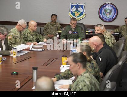 U.S. Air Force General Terrance J. O'Shaughnessy, Commander of the North American Aerospace Defense Command and U.S. Northern Command provides guidance to Department of Defense personnel, in coordination with Customs and Border Protection liaison officers and other supporting interagency partners, during a planning and operational update briefing about mission-enhancing DoD capabilities that will be provided in support of the Department of Homeland Security, Oct. 28, 2018. USNORTHCOM serves as the synchronizer of DoD forces providing mission-enhancing capabilities in support of DHS and CBP alo Stock Photo