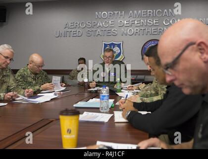 U.S. Air Force General Terrance J. O'Shaughnessy, Commander of the North American Aerospace Defense Command and U.S. Northern Command provides guidance to Department of Defense personnel, in coordination with Customs and Border Protection liaison officers and other supporting interagency partners, during a planning and operational update briefing about mission-enhancing DoD capabilities that will be provided in support of the Department of Homeland Security, Oct. 28, 2018. USNORTHCOM serves as the synchronizer of DoD forces providing mission-enhancing capabilities in support of DHS and CBP alo Stock Photo