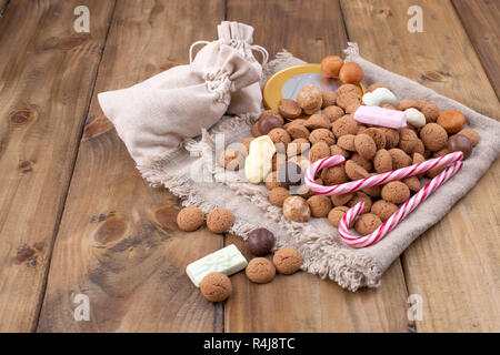 Dutch holiday Sinterklaas greeting card and traditional sweets kruidnoten, pepernoten for the. Festive concept with copy space. Stock Photo