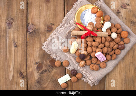 Dutch holiday Sinterklaas greeting card and traditional sweets kruidnoten, pepernoten for the. Festive concept with copy space. Stock Photo