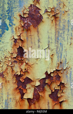 Flaking old and cracked paint from rusty iron Stock Photo