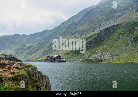 The glacier lake called Balea (Balea Lac) on the Transfagarasan road from Fagaras mountains. Stock Photo