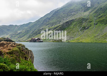 The glacier lake called Balea (Balea Lac) on the Transfagarasan road from Fagaras mountains. Stock Photo