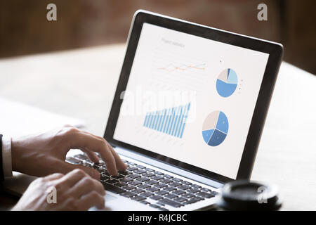 Hands of businessman working in a laptop close up. Stock Photo