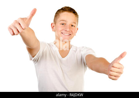 teenage boy giving thumbs up isolated on a white background Stock Photo