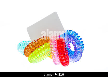 Isolated bunch of  sppiral hair ties with price tag Stock Photo