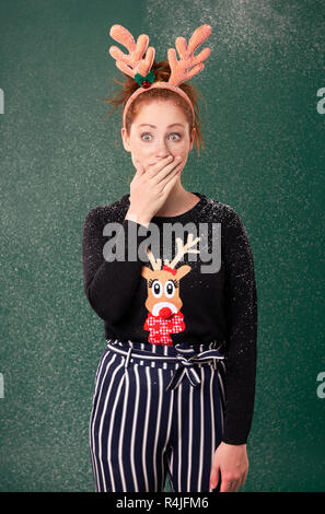 Shocked and worried girl in christmas time Stock Photo