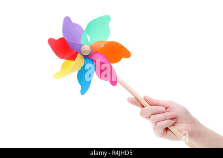 Colorful toy pinwheel windmill on white background Stock Photo