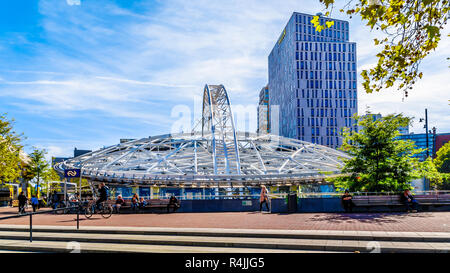 Blaak Station is with the disc shaped overhead steel structure in the center of Rotterdam near Market Hall square, the Netherlands Stock Photo
