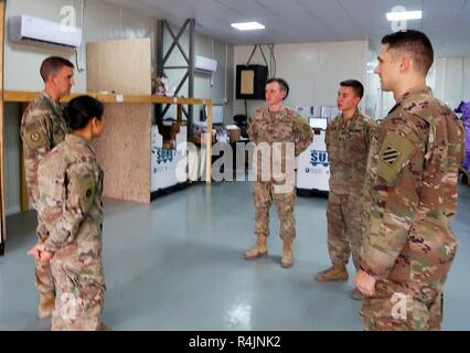 Commander Col. Kim Martindale of the 38th Sustainment Brigade and Col. Todd Erskine of the 300th Sustainment Brigade conducted a site visit to Joint Training Center – Jordan (JTC), MSAB, and H5 from October 23, 2018 to October 25, 2018. During the battlefield circulation the command team visited the Finance, Customs, Postal and Mortuary Affairs Soldiers. Stock Photo