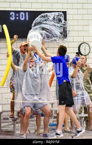 U.S. Air Force Academy -- U.S. Air Force Academy -- Air Force Falcons fans celebrate during the Oct. 27, 2018 water polo contest at the Academy’s Cadet Natatorium. The Falcons were down early, but battled back to defeat the Sunbirds 20-14. Stock Photo