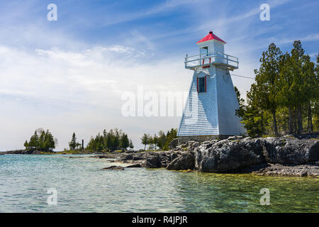 South Baymouth range front lighthouse by Lake Huron on a sunny Spring day, Manitoulin Island, Ontario, Canada Stock Photo