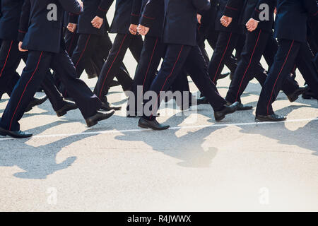 the police are marching. legs. shoes in line Stock Photo