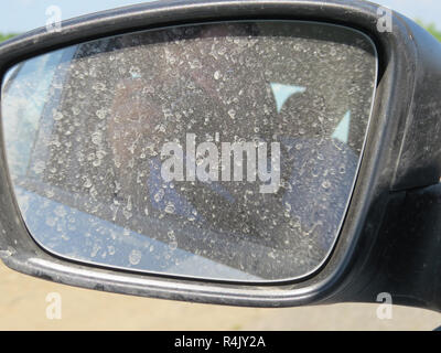 Dirty automobile mirror Stock Photo