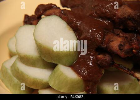 Sate Ayam Madura. The most popular Indonesian chicken satay originated from Madura, East Java. Stock Photo