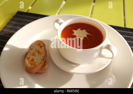 Restaurant menu. Dishes which give at restaurants. Soup in the cup. Stock Photo