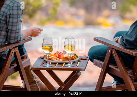 Enjoying Some Wine While Luxury Camping In The Desert Stock Photo