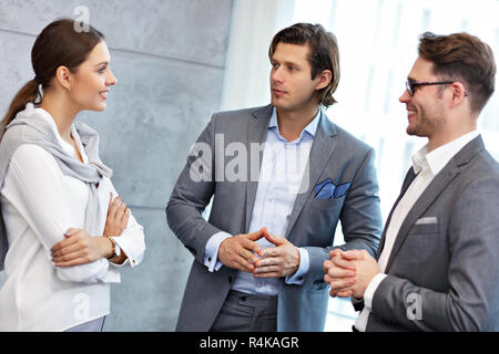 Group of business people sharing their ideas Stock Photo