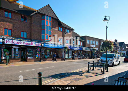Commercial Road, Paddock Wood, Kent, UK. with wide street and retail and charity shops in evidence. Stock Photo