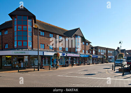 Commercial Road, Paddock Wood, Kent, UK. with wide street and retail and charity shops in evidence. Stock Photo