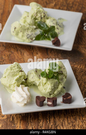 closeup of peppermint ice cream on plates Stock Photo