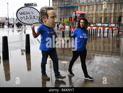 An actor dressed as Mark Zuckerberg arrives at Portcullis House, London, where a hearing is taking place on the impact of disinformation on democracy. Stock Photo