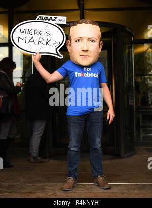 An actor dressed as Mark Zuckerberg arrives at Portcullis House, London, where a hearing is taking place on the impact of disinformation on democracy. Stock Photo