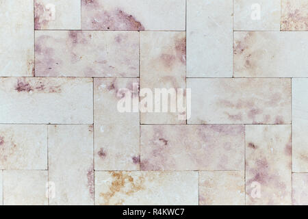 pink marble brick decorative wall outside texture Stock Photo